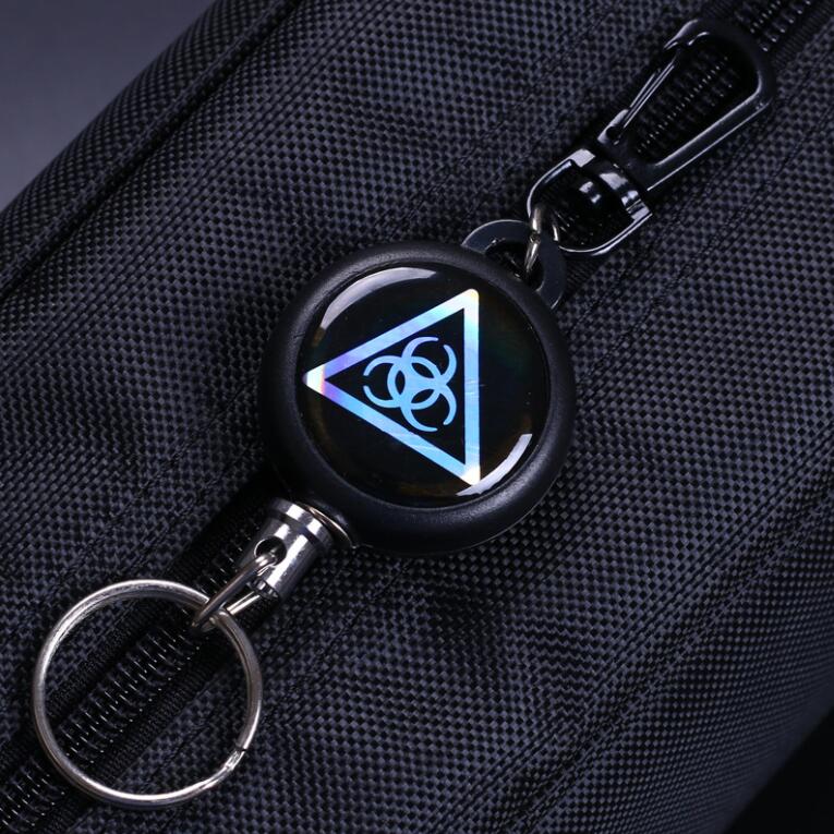 OS0065 Round badge reel ski pass